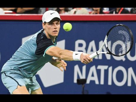 Jannik Sinner, of Italy, plays a shot to Andrey Rublev, of Russia, during their quarterfinal match at the National Bank Open tennis tournament in Montreal on August 10.