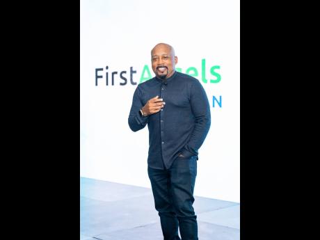 Daymond John, American investor and star from the ABC reality television series ‘Shark Tank’, flashed a smile for the camera at FirstAngels Caribbean’s 10th anniversary celebration at the AC Hotel Kingston. 