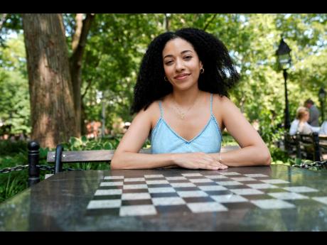 Juliana Pache poses for a photo in Washington Square Park in New York.