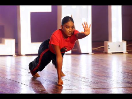 Lianne Fullwood, third-place finisher in the fitness challenge, took the audience through her Kukibo martial arts performance.