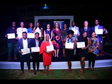 Senator Kamina Johnson Smith (back row, fifth left), minister of foreign affairs and foreign trade; Judith Slater (back row, fifth right), British high commissioner to Jamaica; Marsha Smith (fourth right), minister of state in the Ministry of Education and