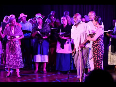 Members of the National Chorale of Jamaica are joined by Sir Willard White at right  and his wife, Lady Sylvia Kervorkian-White.