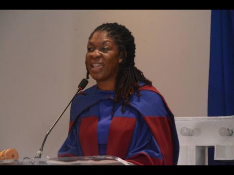 Melissa Lunan-McTavish, newly elected president of the Jamaica Association of Education Officers, addresses the organisation’s 60th Anniversary Banquet and Inauguration Ceremony last Thursday.