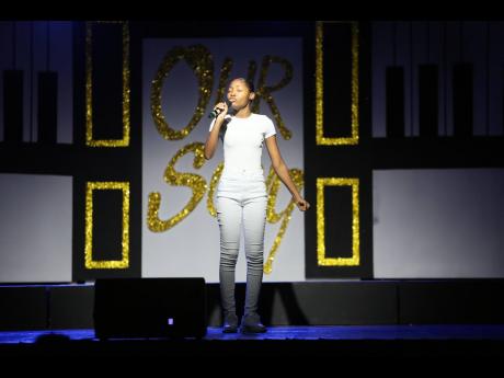 Sasha Gay Sutherland performing on stage moments before being surprised with a scholarship last saturday at the ‘Our Song’ showcase, part of Voice Box’s Summer Singing Intensive programme, held in the Campion College auditorium.