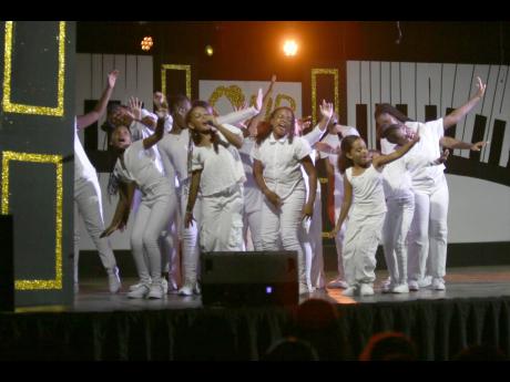 Some of the 50 students who prticipated in Voice Box’s Summer Singing Intensive programme performing inside the auditorium at Campion College on Saturday evening. 