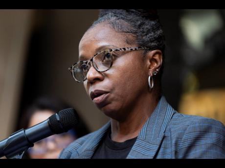 Carol McMillian, bakery manager at Kroger-owned King Soopers and member of Local 7, speaks about the Kroger and Albertsons merger during a news conference outside the federal courthouse before a hearing on the merger on Monday, August 26, 2024, in Portland