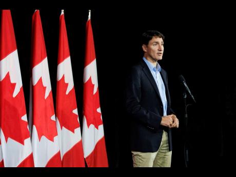 Canadian Prime Minister Justin Trudeau speaks with reporters during a news conference at the Federal ministers cabinet retreat in Halifax, Nova Scotia, Monday, August 26, 2024.