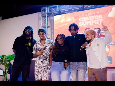 All smiles after an insightful and thought-provoking music panel under the theme ‘Charting Success: Jamaican Music in the Digital Age’, (from left) Creative Director Yannick Reid, moderator of the panel; DJ Mac; Creative project manager and producer, L