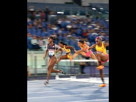 From left: Jamaica’s Ackera Nugent leads the United States’ Kendra Harrison, Switzerland’s Ditaji Kambundji, and the Bahamas’ Devynne Charlton at the Wanda Diamond League Golden Gala inside Rome’s Stadio Olimpico yesterday.