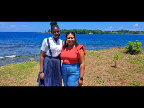 Student Shaynel Hines (left) with her mother, Ann-Marie Weston.