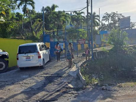 Students and teachers of the Sudbury Primary School in Orange, St James, arriving at the institution ahead of the scheduled 8:30 a.m. start time for the start of the school year on Monday.