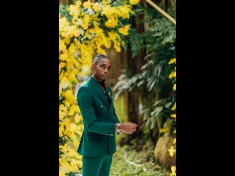 The dapper groom waits patiently for his beautiful bride to walk down the aisle.