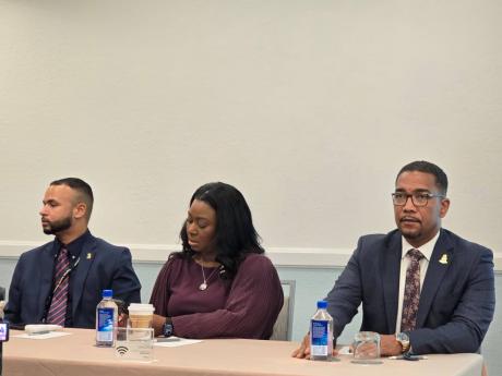 Cayman Islands’ Gary Hendricks-Dominguez (left), deputy director of international marketing and promotion; Rosa Harris, director or tourism; and Kenneth Bryan, minister of tourism and ports.