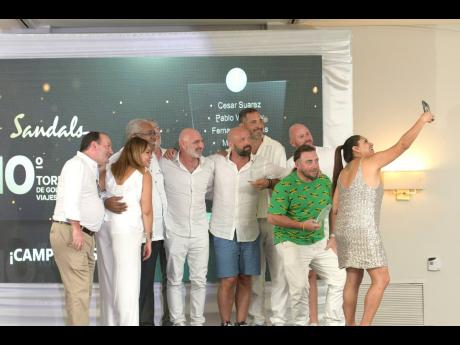 Gary Sadler (third left), executive vice president, sales and industry relations, Unique Vacations, pose for a selfie with members of the Argentinian Travel Advisors golf teams, which shared the title of Sandals 10th annual Latin American Travel Advisors G