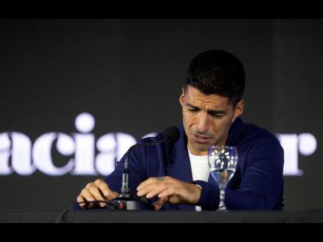 Uruguayan soccer player Luis Suarez announces his retirement the national soccer team in Montevideo, Uruguay, on Monday,