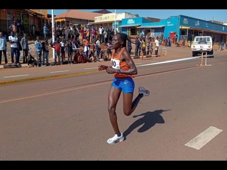 Rebecca Cheptegei, competes at the Discovery 10km road race in Kapchorwa, Uganda, on Friday, January 20, 2023.