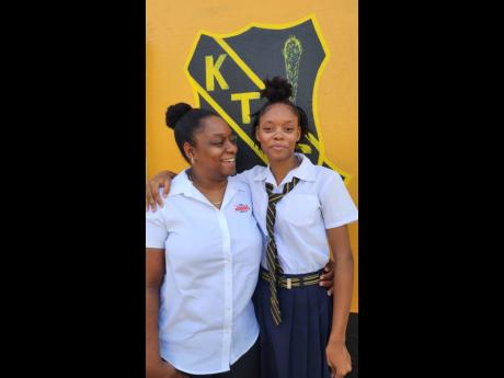 Latoya Young is very proud of her daughter, Rhianna Taylor’s CSEC performance at kingston Technical High School.