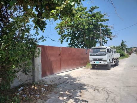 The gate leading to the property in Greenwood, St James.