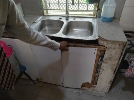 Cupboards partially eaten by termites at Tulloch Primary.