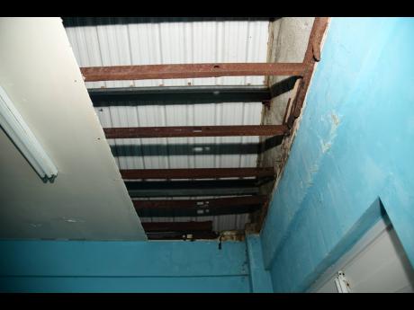 The damaged roof of a grade 10 classroom at Happy Grove High.