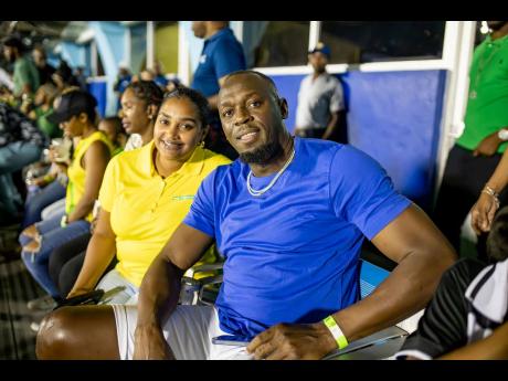 The world’s fastest man, Olympian Usain Bolt, soaked up the exciting atmosphere inside the National Stadium, sitting next to Kerry Ann Bryan, Wray & Nephew White Overproof Rum brand manager and Reggae Boyz sponsor.