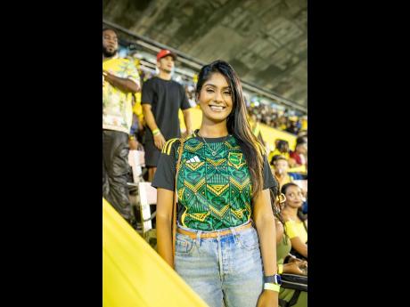 TV presenter Mariah Ramharack, wore her 2024 Jamaica jersey and best smile.