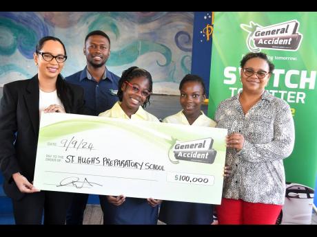 St Hugh’s Prep principal Sasha Wright (right) and robotics team members accept General Accident’s (GenAc) donation towards their journey to Turkey with big smiles. Making the presentation on Monday, September 9, are GenAc’s Assistant Manager and Unde