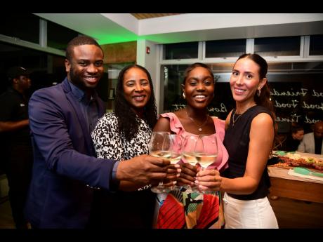 Enjoying a few glasses of wine at the evening’s mixer were (from left) Romario Buchanan, director of human resources at ROK Hotel; Sherene Brown, director of food and beverage at ROK Hotel; Jodi-Ann Hamilton, restaurant manager at ROK Hotel; and Meaghan 