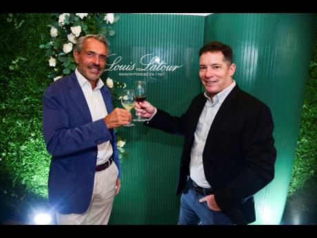 Building bridges across the ocean, Louis Latour board member and director of sales and marketing, Bruno Pepin, toasted with Caribbean Producers Jamaica Limited’s Chief Executive Officer, Nicholas Hospedales. 