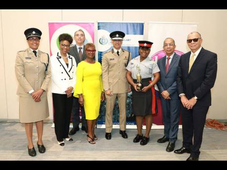 From left: Senior Superintendent Charmine Shand, CEO of the LASCO Chin Foundation Rosalea Hamilton, LASCO Distributors CEO John De Silva, LASCO Financial Services CEO Jacinth Hall-Tracey, Commissioner of Police Major General Antony Anderson, winner of the 