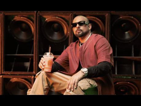 Keeping cool, Sean Paul poses with Burger King’s new Frozen Pink Lemonade.