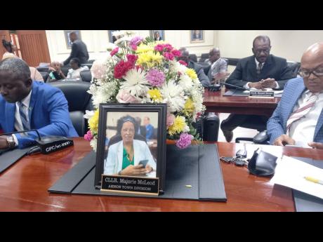 A memorial at the seat of late Aenon Town division councillor Marjorie McLeod-McFarlane during Thursday’s sitting of the Clarendon Municipal Corporation.