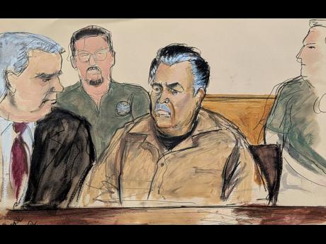 In this courtroom sketch, Ismael Zambada Garcia ‘El Mayo’, (centre), is seated beside his defense attorney Frank Perez (left), in Federal court, in the Brooklyn borough of New York yesterday.