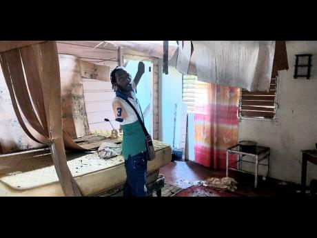 Top left: Thirty-three-year-old Brandon Miller shows the state of his house in Paradise Acres, St James, last week.