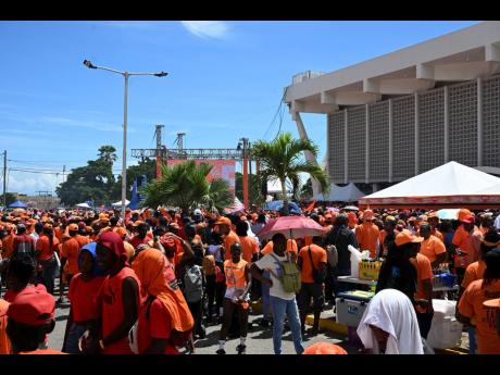 The crowd of PNP supporters outside the National Arena yesterday. 