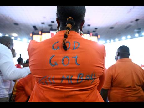 A supporter sends a spiritual message at the PNP’s annual conference. 