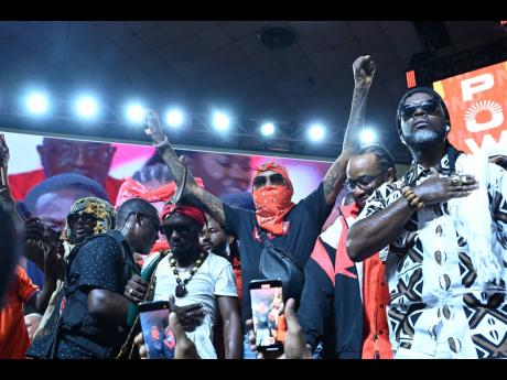 Vybz Kartel (left) and Accompong Maroon Chief Richard Currie (right) at the People’s National Party’s 86th annual conference.