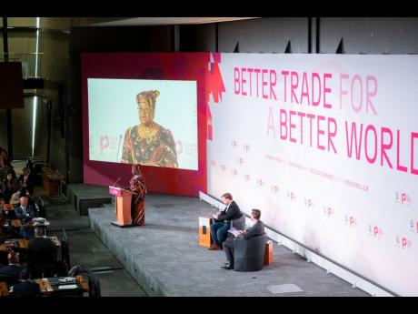 Director General of WTO Ngozi Okonjo-Iweala speaks at the launch of World Trade Report 2024 in Geneva.