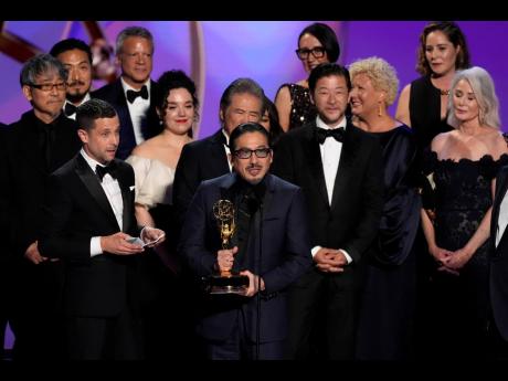 Justin Marks (centre) Hiroyuki Sanada (centre right) and the team from ‘Shogun’ accept the award for Outstanding Drama Series during the 76th Primetime Emmy Awards on Sunday at the Peacock Theatre in Los Angeles. 