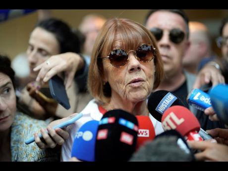 Gisele Pelicot speaks to the media as she leaves the Avignon courthouse in southern France on September 5.