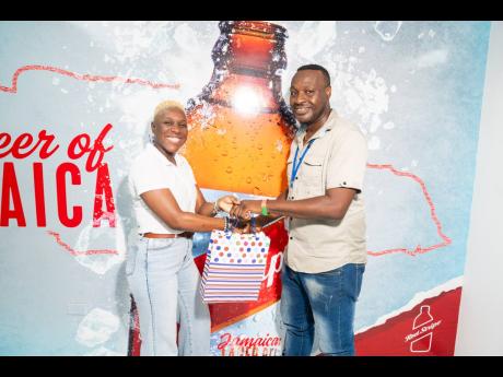 Red Stripe continues its tradition of giving back by rewarding top PEP performers among its employees’ children. This year, Channel Development Manager Dian Rance and Technical Support Analyst Richard Sharpe accepted awards on behalf of their children. T