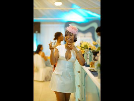 Kenneisha Campbell, public relations and media manager at the Jamaica Food and Drink Festival, dazzled in high tea fashion.