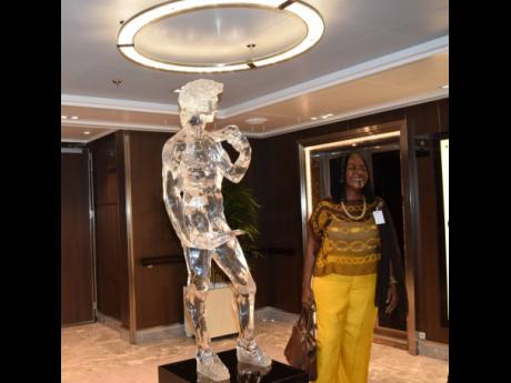 Norma Rhoden-Walters, custos of St Ann, poses beside Michaelangelo’s ‘David’ taking a selfie. The statue is one of the interesting pieces of art that are featured aboard the Nieuw Statendam cruise vessel, which made its maiden voyage to Ocho Rios, Jamaica, in January 2019.  