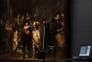 A microscopic image enlarging a 4x6 millimetre, part of the painting on Rembrandt’s Night Watch, which will be restored next year in the public eye, is seen on a screen next to the painting at the Rijksmuseum in Amsterdam, Netherlands, 2018. Rembrandt va