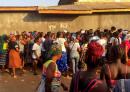 People gather at Redemption Hospital yesterday where victims of a stampede at a Christian crusade outside Monrovia, Liberia, on Wednesday night were taken to. 