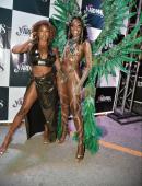 Trinidadian designer Nikitha Cornwall (left), stands with her costume – Aja – modelled by former Miss World Trinidad and Tobago Athaliah Samuel.