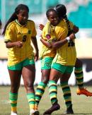 Jamaica Uner-20’s Avery Johnson (left) celebrates a goal with teammates during a Concacaf Under-20 Women’s Championship game against Panama at the Estadio Felix Sanchez in the Dominican Republic yesterday.