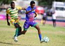 Portmore United’s Shakeon Satchwell (right) dribbles away from Vere United’s Kemmoy Phillips during a  Jamaica Premier League match at Ashenheim Stadium, Jamaica College on Sunday, February 26, 2023. Portmore won 2-0.