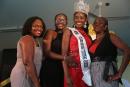 Miss Clarendon Festival Queen Shanecia Daley is congratulated by (from left) her friend Christine Russell-Lewin; sister, Shaniqua Daley; and mother, Sophia Daley.