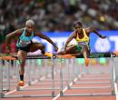 Jamaica’ s Megan Tapper (right) and  Devynne Charlton of the Bahamas competing in their women’s 100 metres hurdles semifinal at the 2023 World Athletics Championships in Budapest, Hungary.